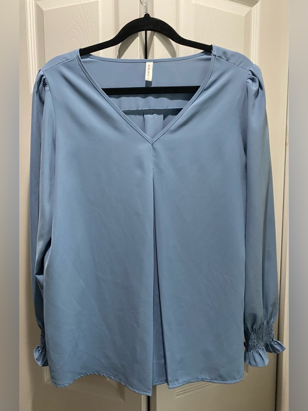 Women’s blue pullover blouse size L